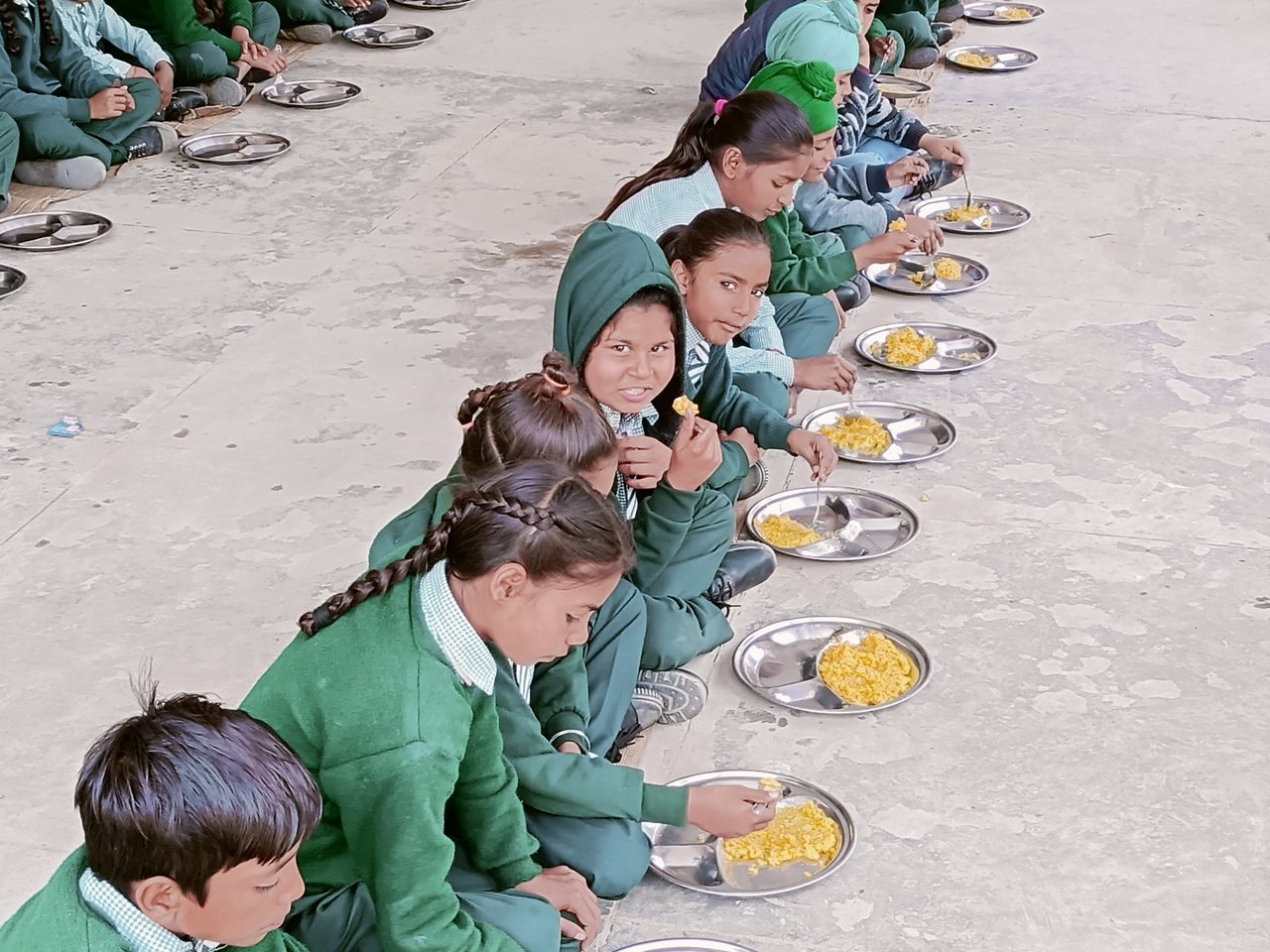Children at a school mid-day meal in India (file photo)
