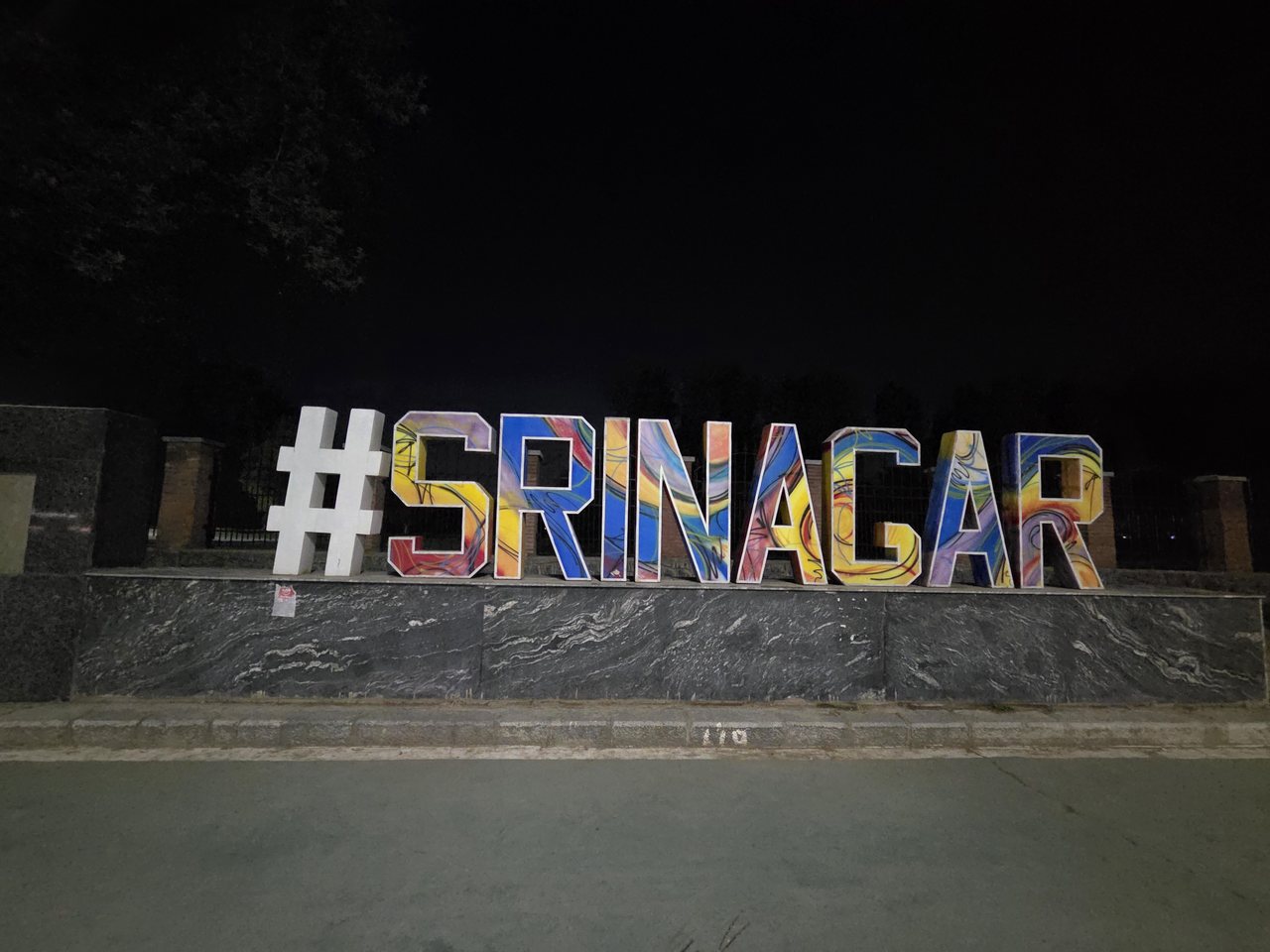 A Srinagar sign lit up at night (file photo)